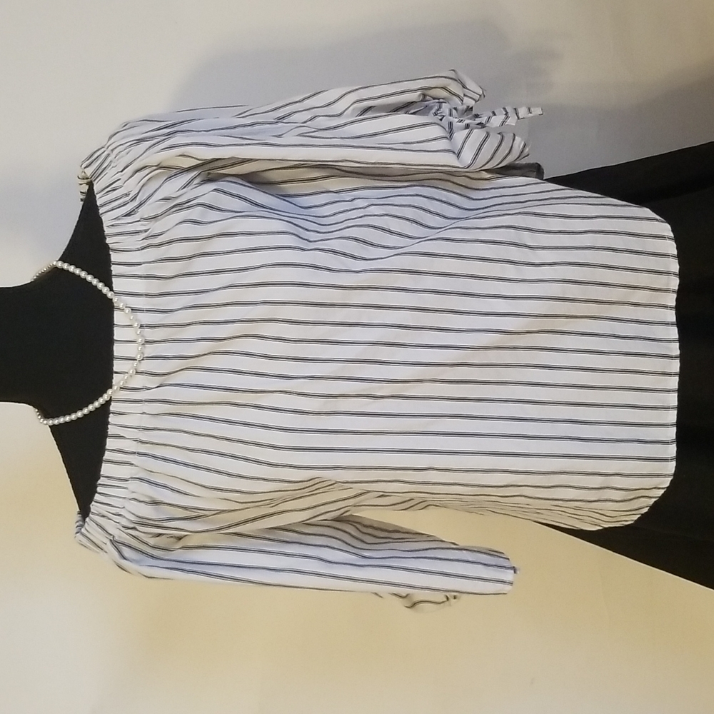 White with black Striped print top, seven sisters